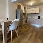 Ad *